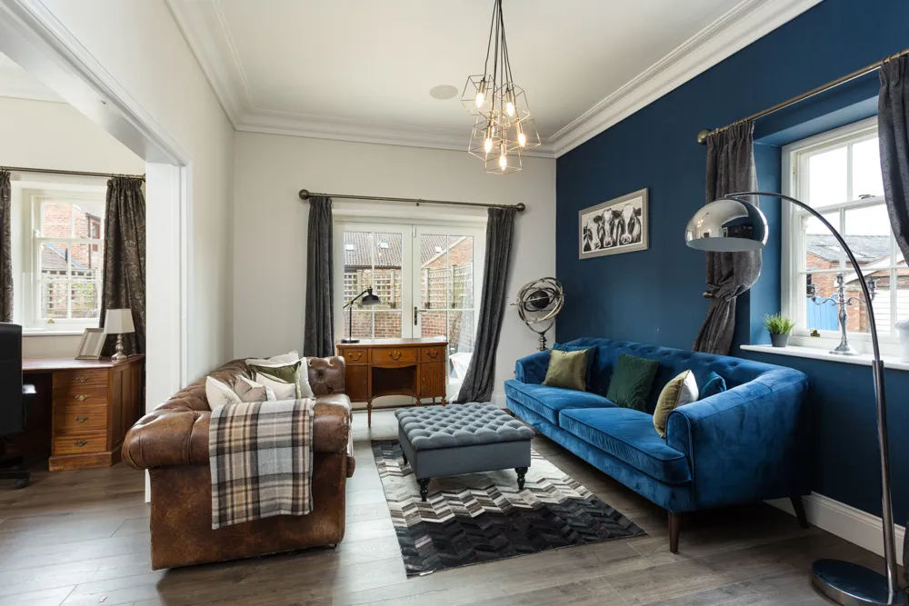 The snug, with French doors to the terrace and the study beyond